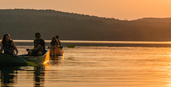 Canoeing Ontario youth summer sunset